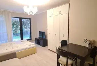 Salon z szafą и łóżkiem