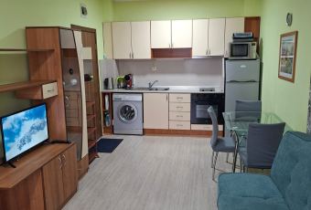widok na salon i aneks kuchenny