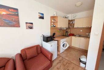 widok na salon i aneks kuchenny