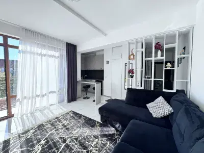 pokój dzienny z umeblowaniem