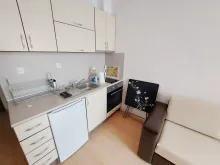 Aneks kuchenny w pokoju dziennym
