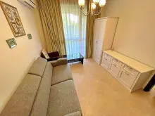 sofa rozkładana, komoda, szafa