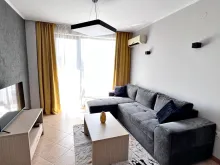 sofa narozna, telewizor