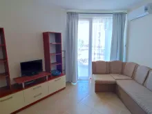 sofa narożna, telewizor, segment pokojowy