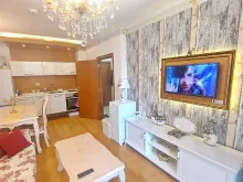 sofa i telewizor
