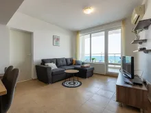sofa narozna, telewizor