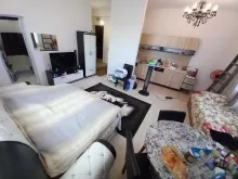 łózko i telewizor