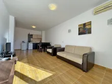 sofa, telewizor, aneks kuchenny