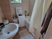 Łazienka conata z toaletą