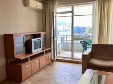 Fotel i telewizor z szafką