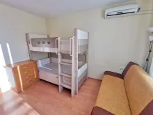 Łóżko piętrowe i sofa