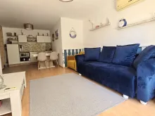 widok na salon i aneks kuchenny