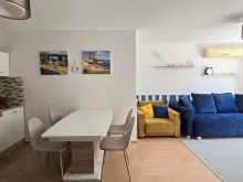 widok na salon i aneks kuchenny
