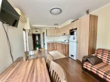 widok na salon i aneks kuchenny