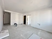 widok na salon i aneks kuchenny