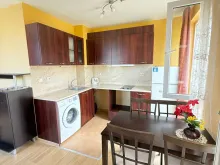 widok na salon i aneks kuchenny