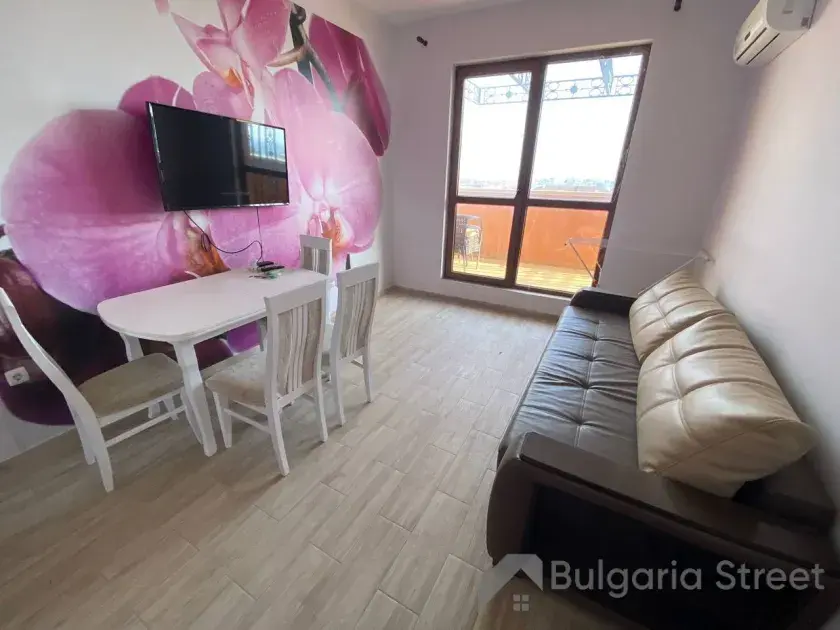 sofa , stół z krzeslami