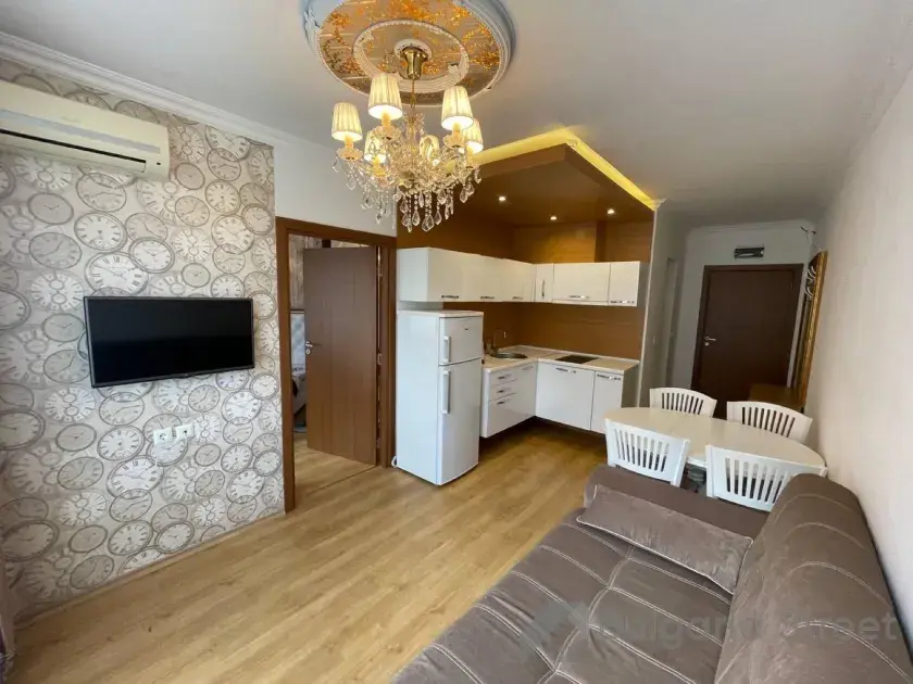 stół z krzesłami, sofa