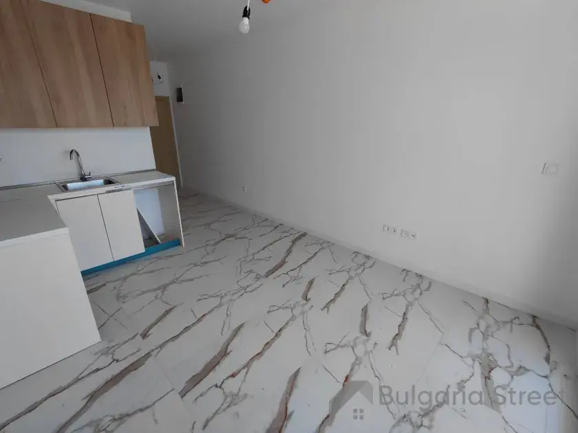 widok na pokoj oraz aneks kuchenny do własnej aranżacji